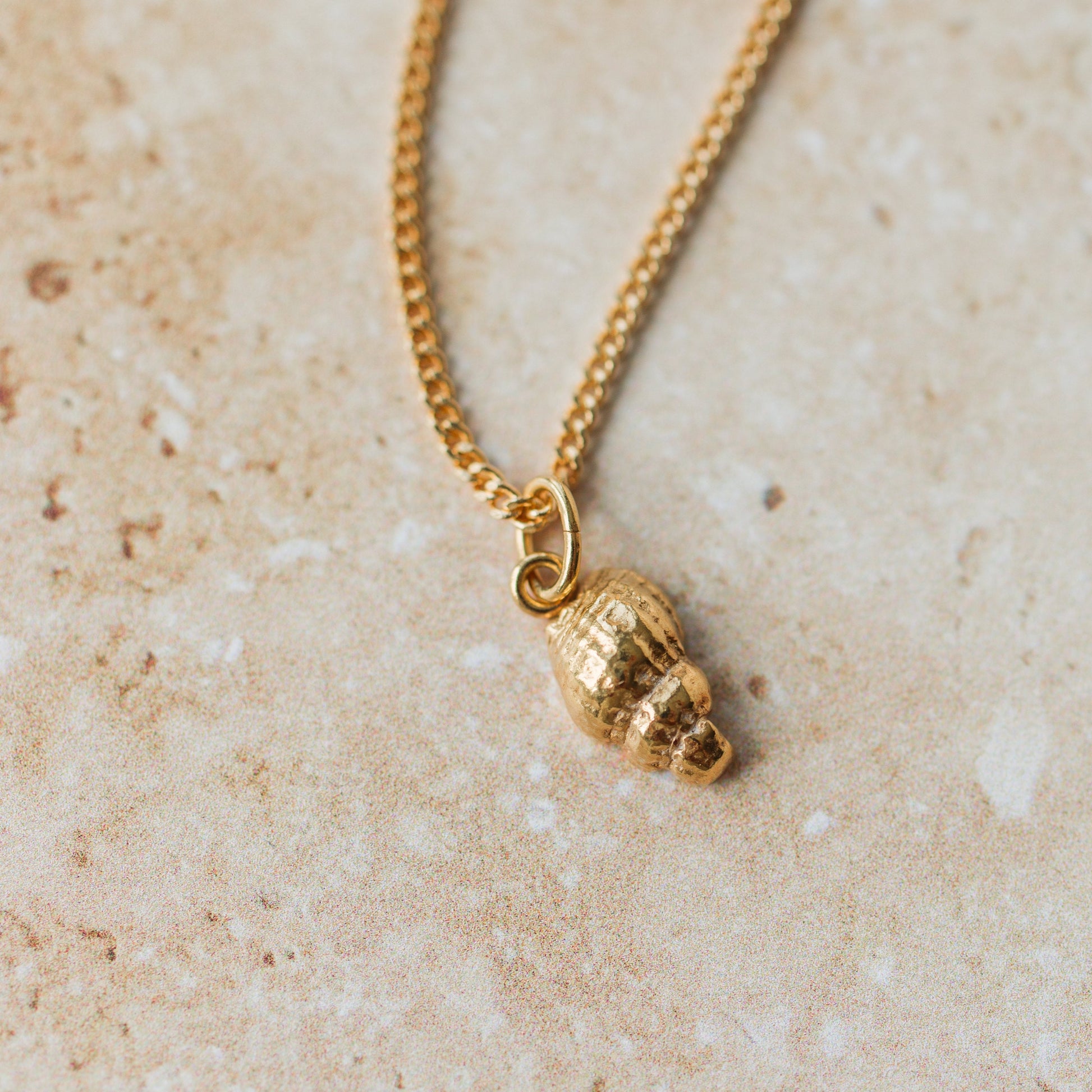 Handmade gold dainty whelk shell - Iris & Lolli