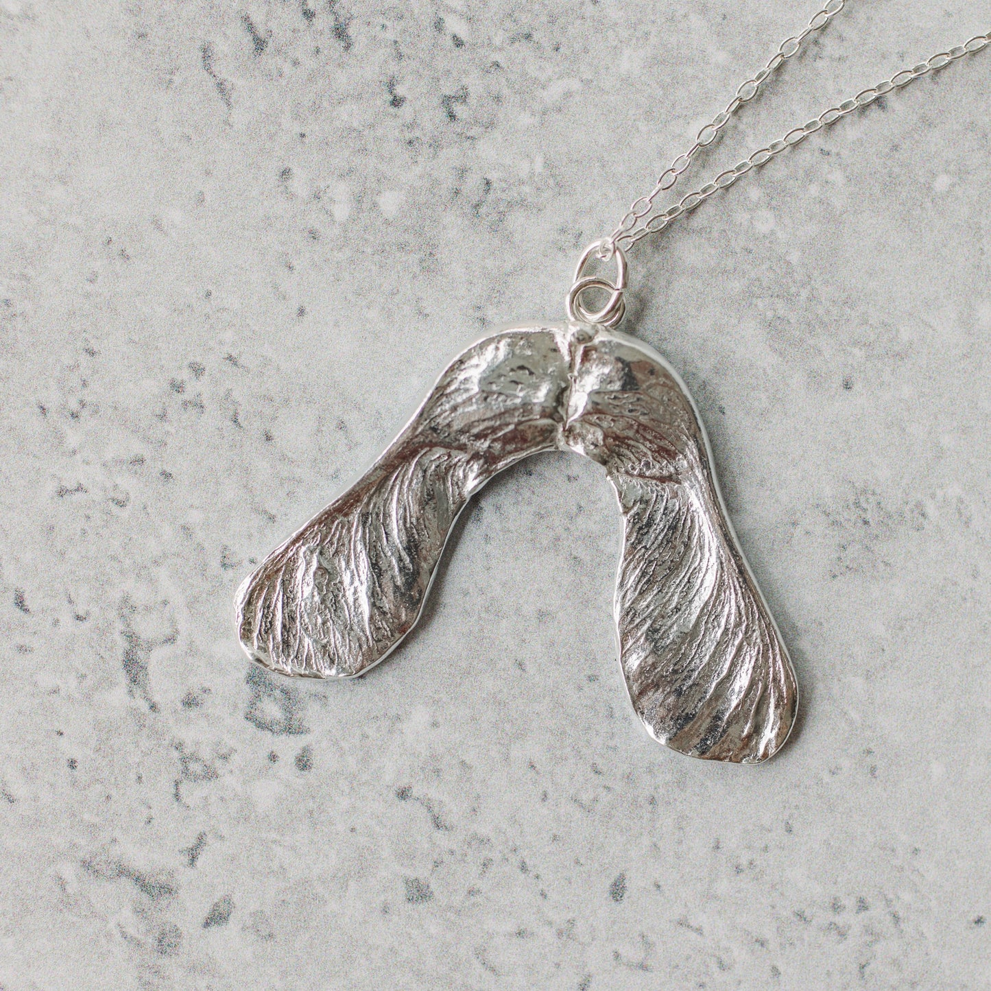 Handmade silver sycamore seed necklace