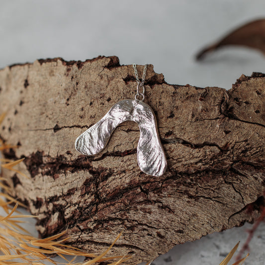 Handmade silver sycamore seed necklace