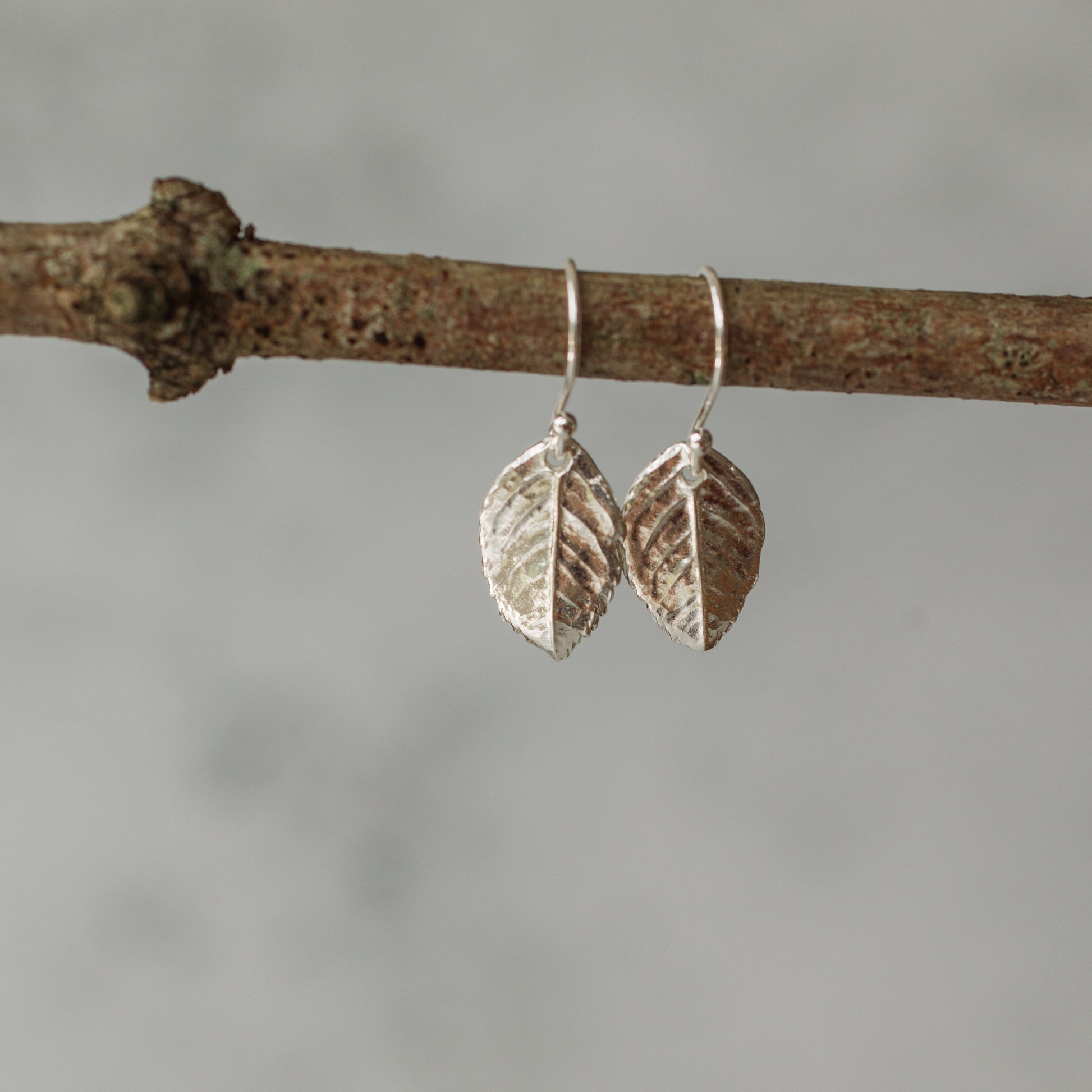 Handmade silver rose leaf earrings