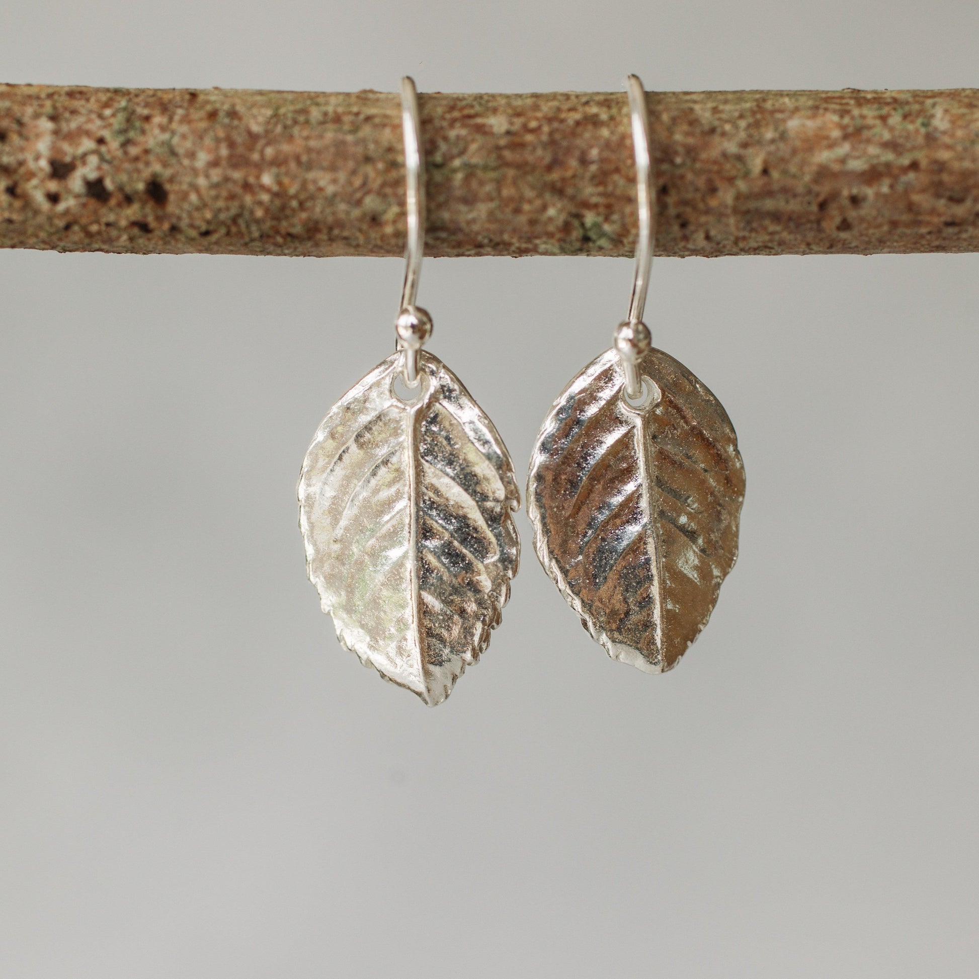 Handmade silver rose leaf earrings