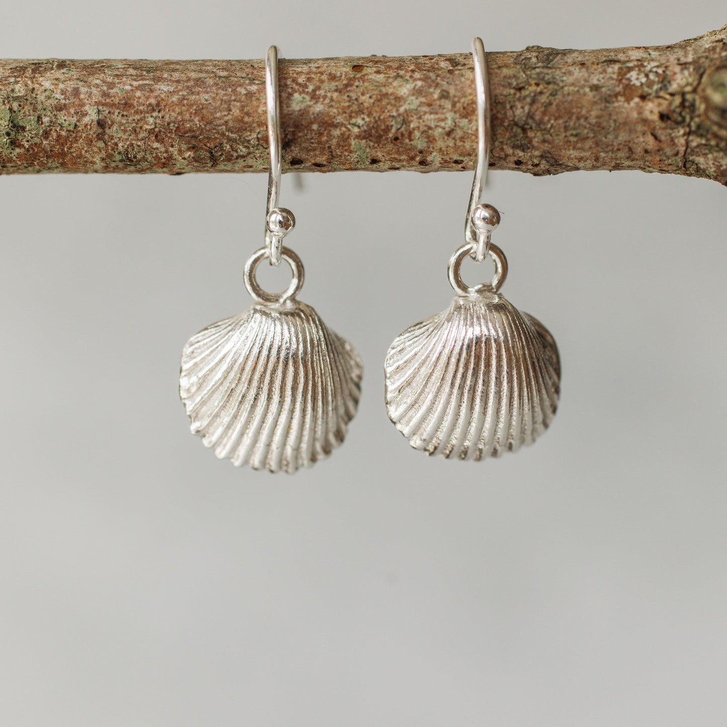 Handmade silver cockle shell earring