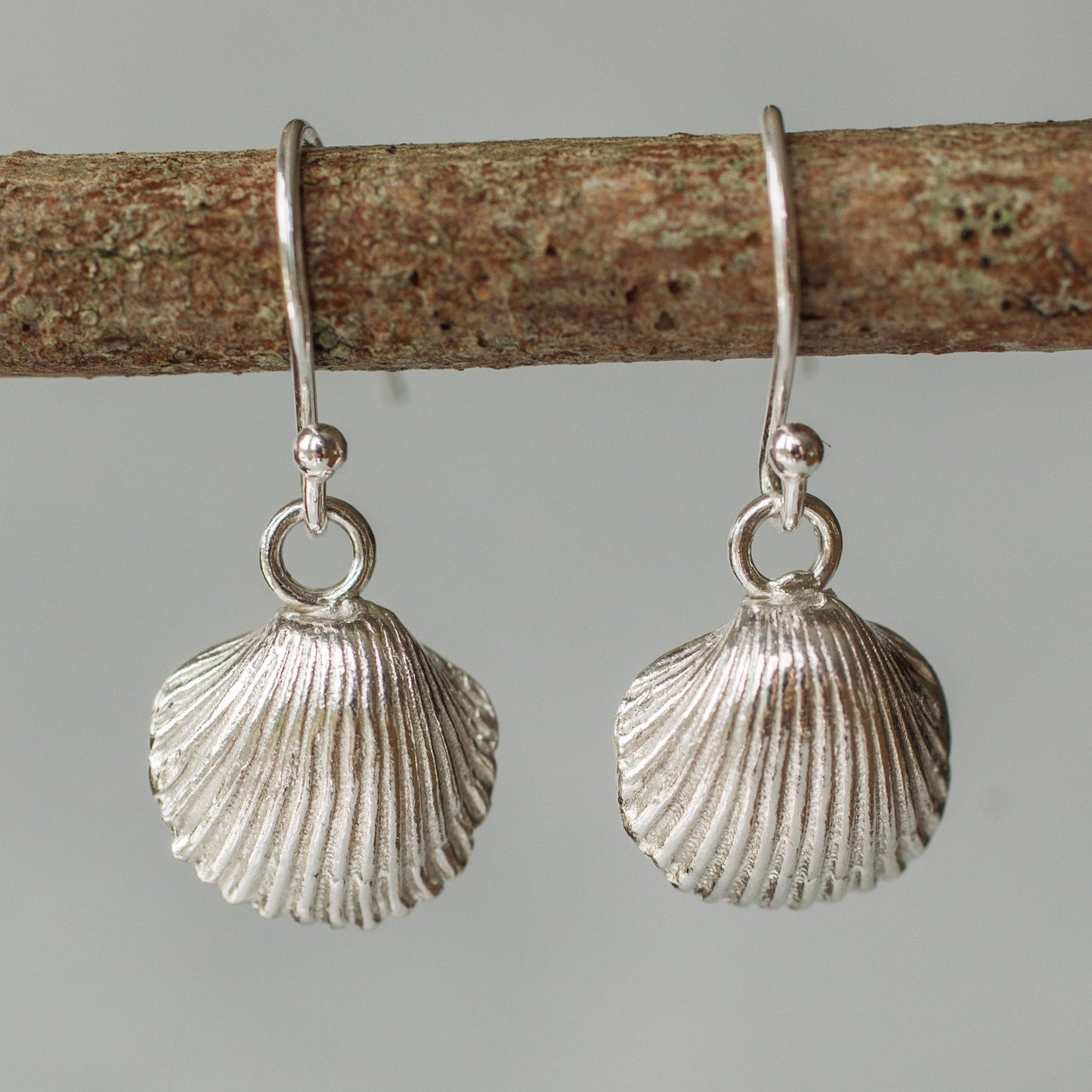 Handmade silver cockle shell earring