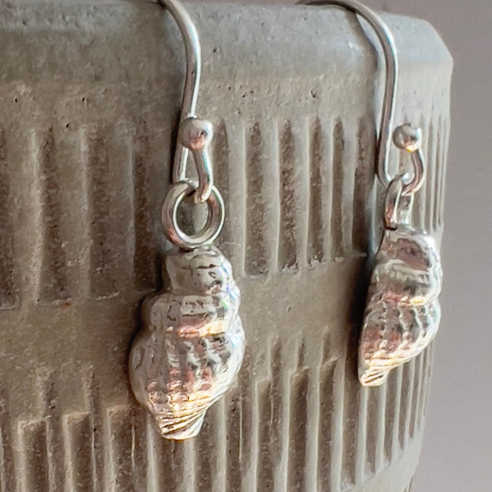 Handmade silver dainty whelk shell earrings