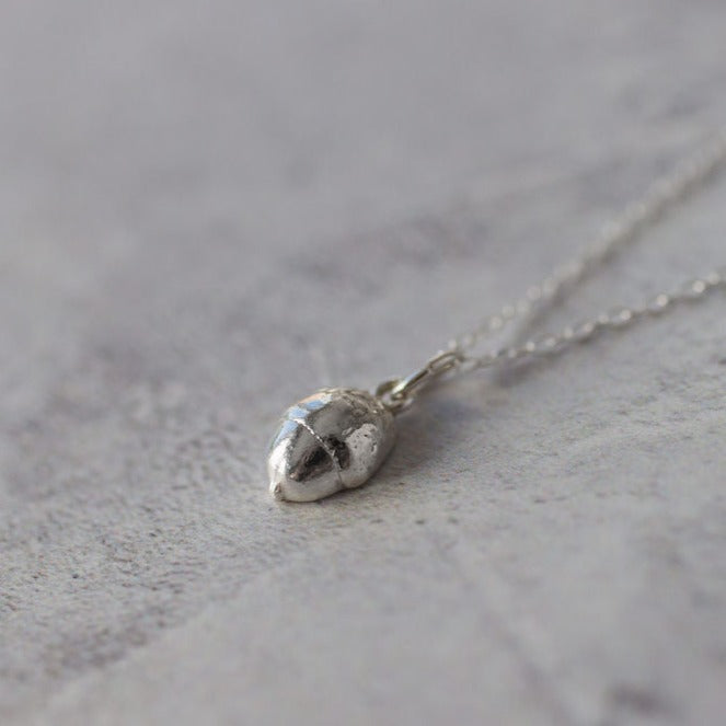 Handmade silver baby acorn necklace