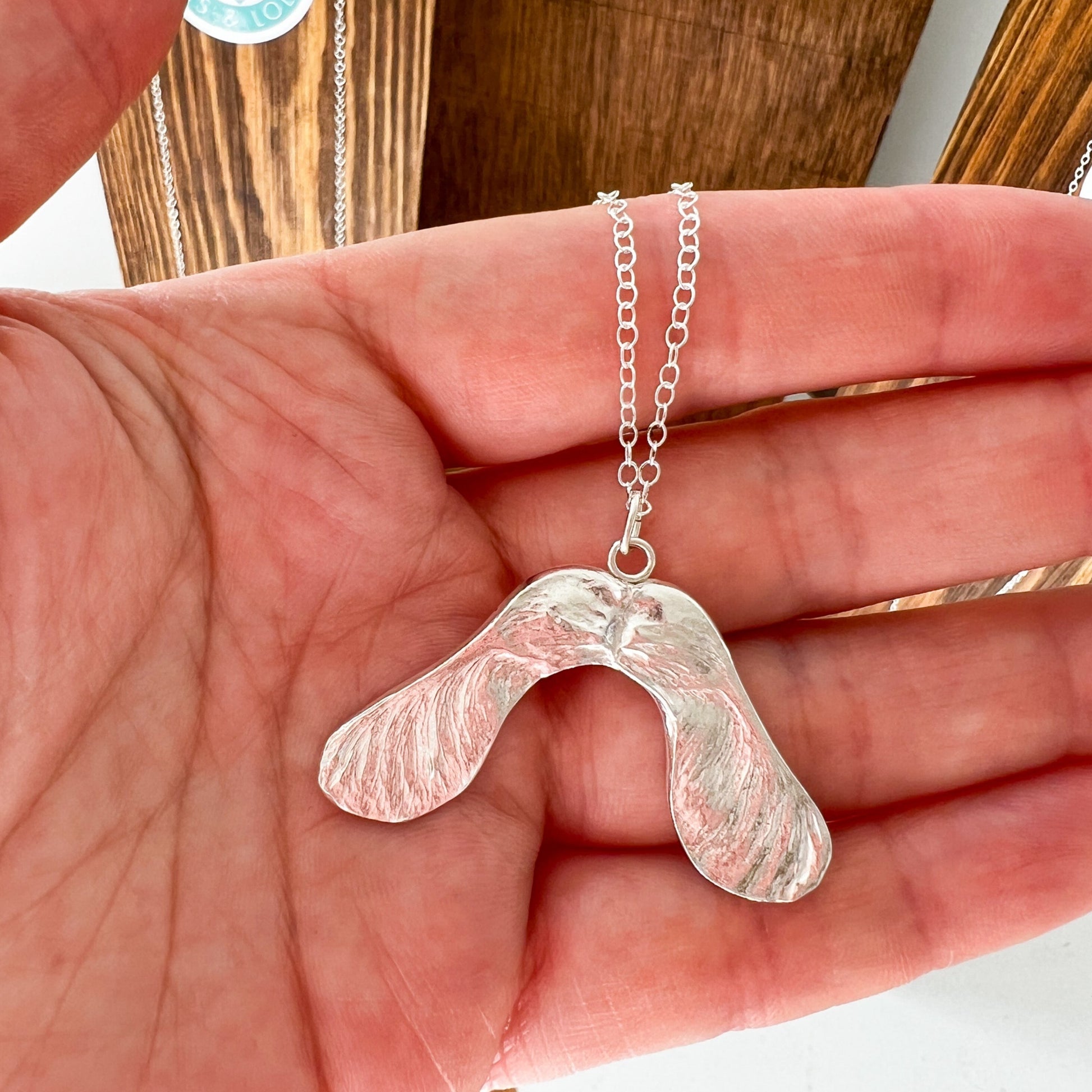 Handmade silver sycamore seed necklace